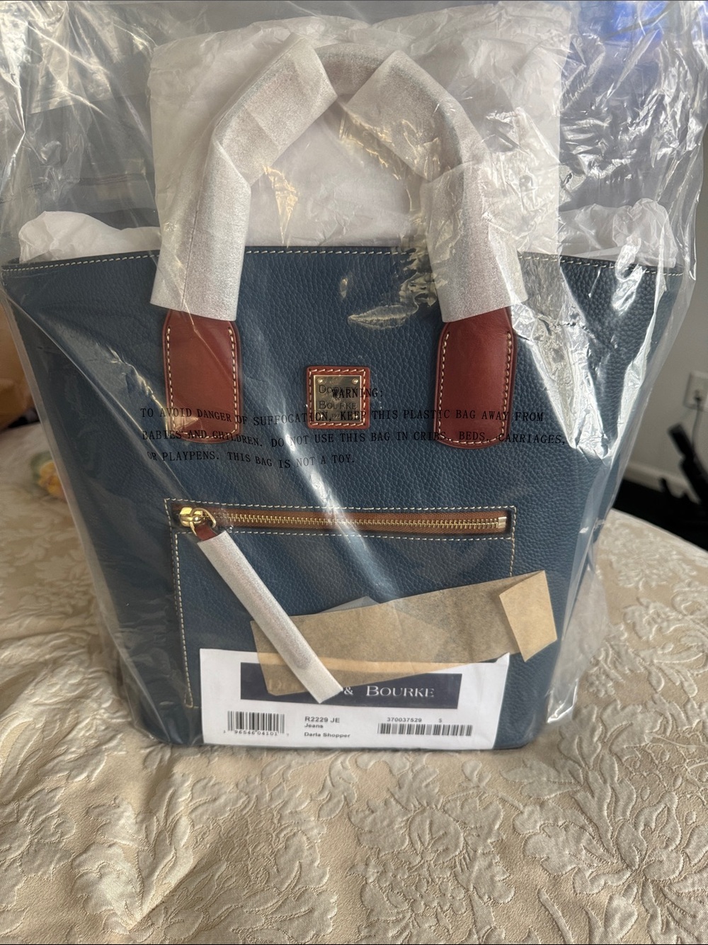 Dooney & Bourke Navy Tote with Brown Leather Trim and Gold Hardware